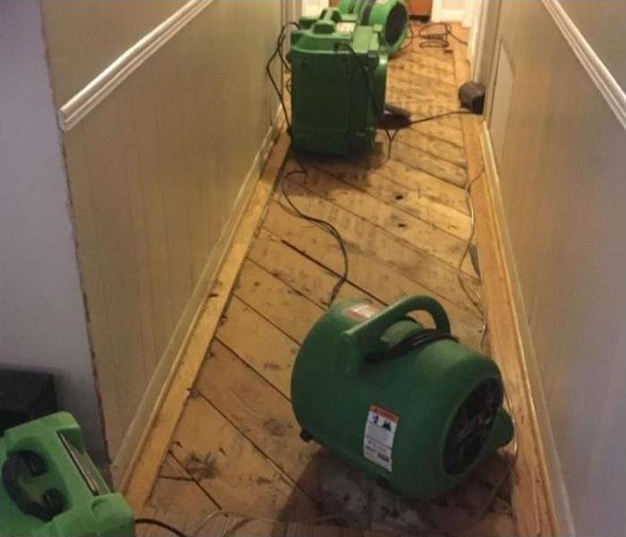 Drying Out Wood Floor Damaged from Flooding